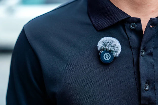 Wireless clip-on microphone with windscreen on a polo shirt – DJI Mic 3 vs RODE Wireless GO 3